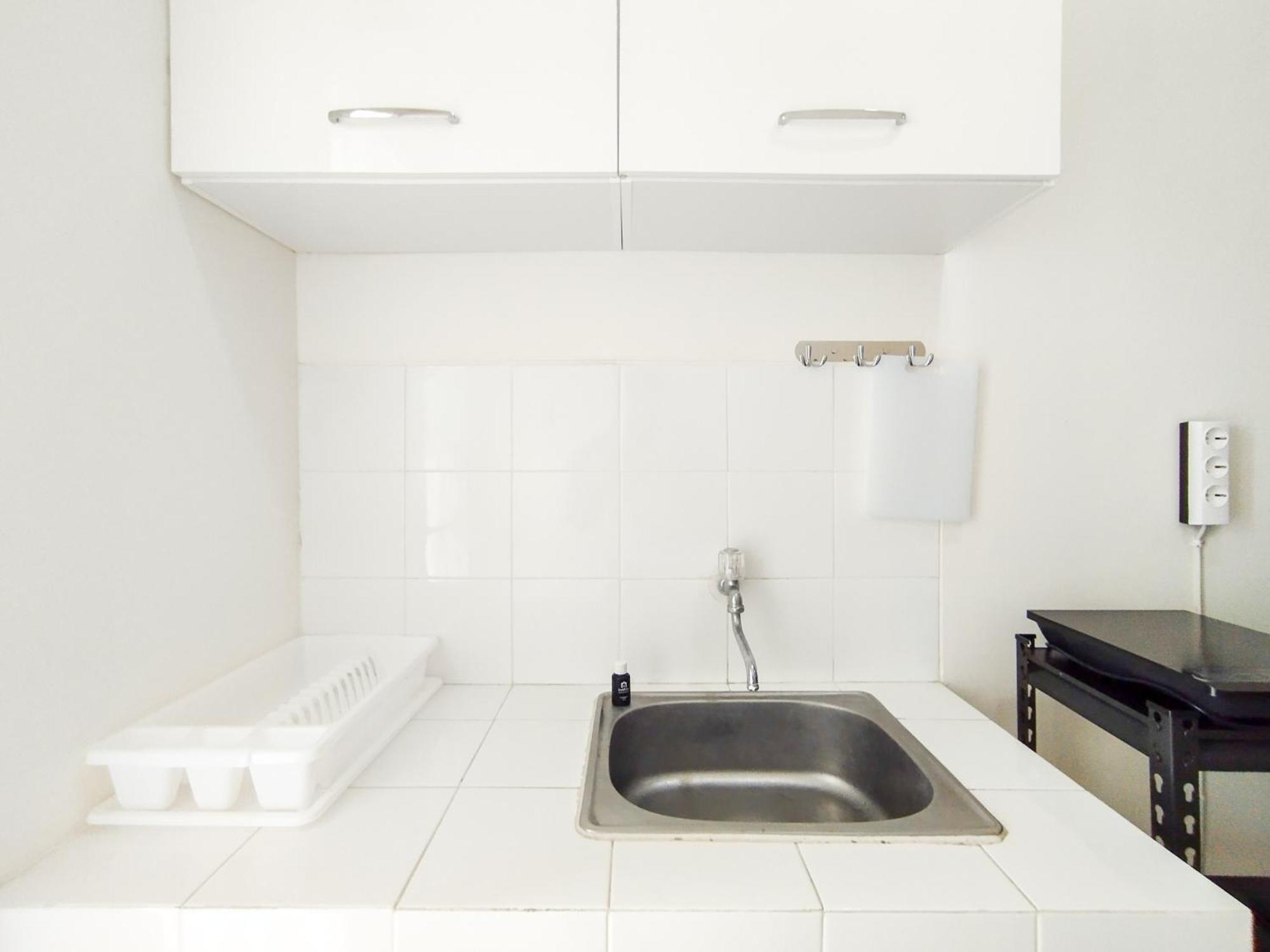 Simply Design 1br At Parahyangan By Travelio Apartemen